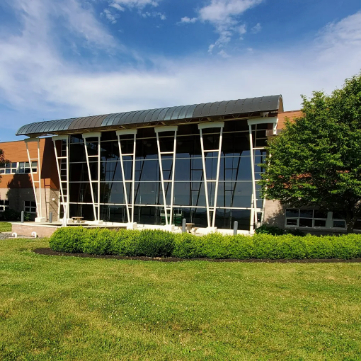Commercial building with a distinctive curved glass facade